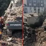 Yıkımı yapılan bina iş makinesinin üzerine çöktü