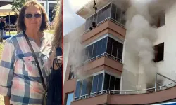 Yangın çıkan evde bıçakla öldürülmüş olarak bulundu