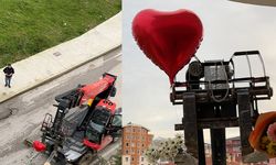 Sevgililer Günü’nü unuttu, iş makinesiyle balkona çıkarttığı güllerle gönül aldı