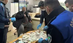 Dilencinin üzerinden çıkan paralar say say bitmedi!