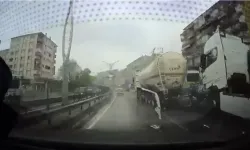 Otomobil, TIR ile tanker arasına sıkıştı; kaza kamerada