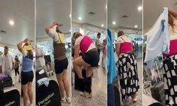 Bagaj ücretinden kaçmak için yaptığı şey herkesi şaşırttı: Hafiflesin diye üst üste giydi