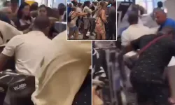Sıcaktan bunalan halk vantilatör kapmak için mağazada birbirini ezdi