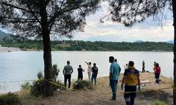 Burdur'da baraj gölüne giren genç kayboldu