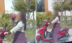 Seyir halindeki motosiklette alkol içen kadın vatandaşları isyan ettirdi