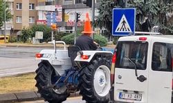 Traktör sürücüsünden yağmura karşı dubalı çözüm