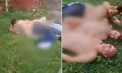 Çimlerin üzerinde mide bulandıran görüntü! Çevredekilere aldırış etmediler