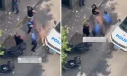 Çıplak gezen şahıs sokağı birbirine kattı, polislere saldırdı