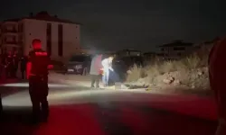 Sokakta hareketsiz yatan Ümit Yılmaz başından tabancayla vurulmuş