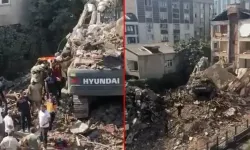 Yıkımı yapılan bina iş makinesinin üzerine çöktü