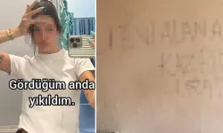 Müşterisine ev gösteriyordu, duvardaki yazıyı görünce donup kaldı