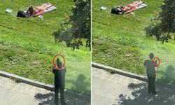 Parkta skandal anlar! Güneşlenen kadını gizlice görüntüledi