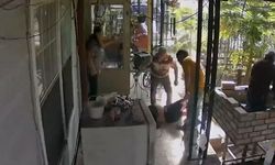 Tanımadıkları kadın evlerine girdi, mutfağı dağıtıp masanın altına saklandı