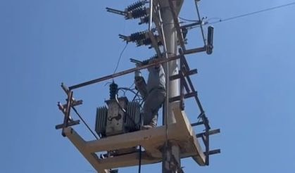Elbistan’da vinç operatörüyle kavga eden tamirci elektrik direğinde mahsur kaldı