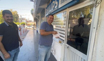 Sabah dükkanını açan esnaf, kapıya konan siftah zarfıyla şaşırdı