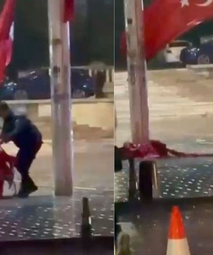 Taksim Meydanı'nda yere düşen Türk bayrağını polis kaldırdı