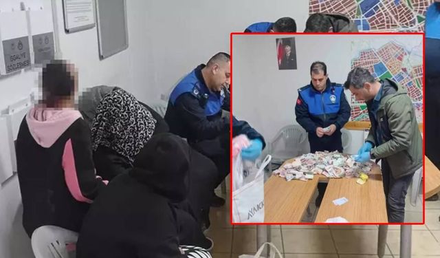 Engelli çocukla dilencilik yapan 2 kadının üzerinden çıkan paralar say say bitmedi