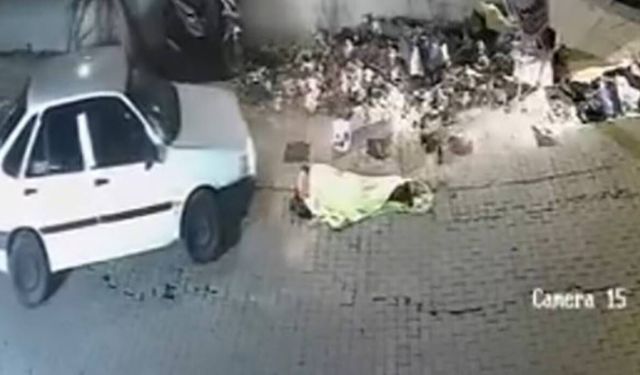 Kaldırımda uyuyanı fark etmedi, üzerinden otomobille geçti: O anlar kamerada