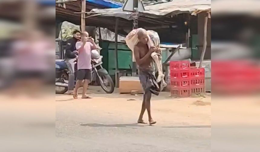 Para çekmek için kardeşinin mezarını kazıp, iskeletiyle bankaya gitti