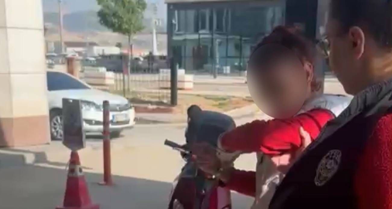 Çöpte karnını doyuran kediye taş atan kadın yakalandı